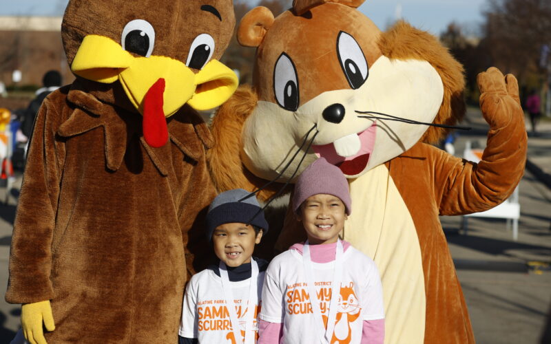 Kids with Sammy Scurry people in mascot costumes