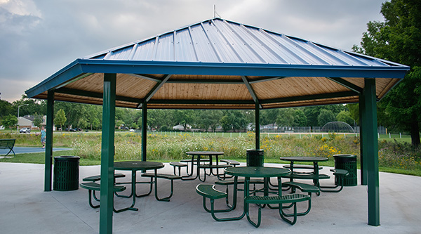 A picnic and shade structure on a cloudy day at Maple Park