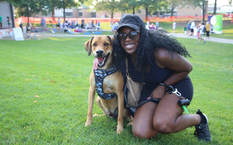 Lady with her dog at canine carnival